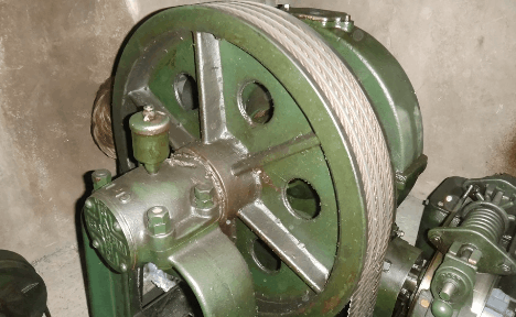 An old system of elevator pulley.