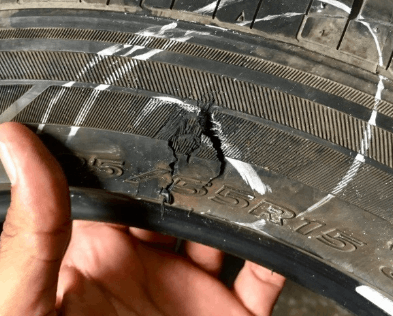 Car tire sidewall damage.